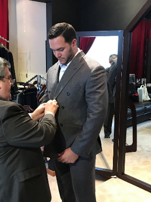 tailor and client during fitting