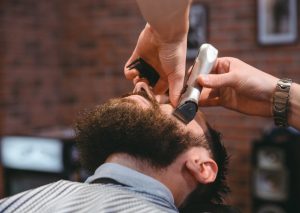 man with beard at barber shop