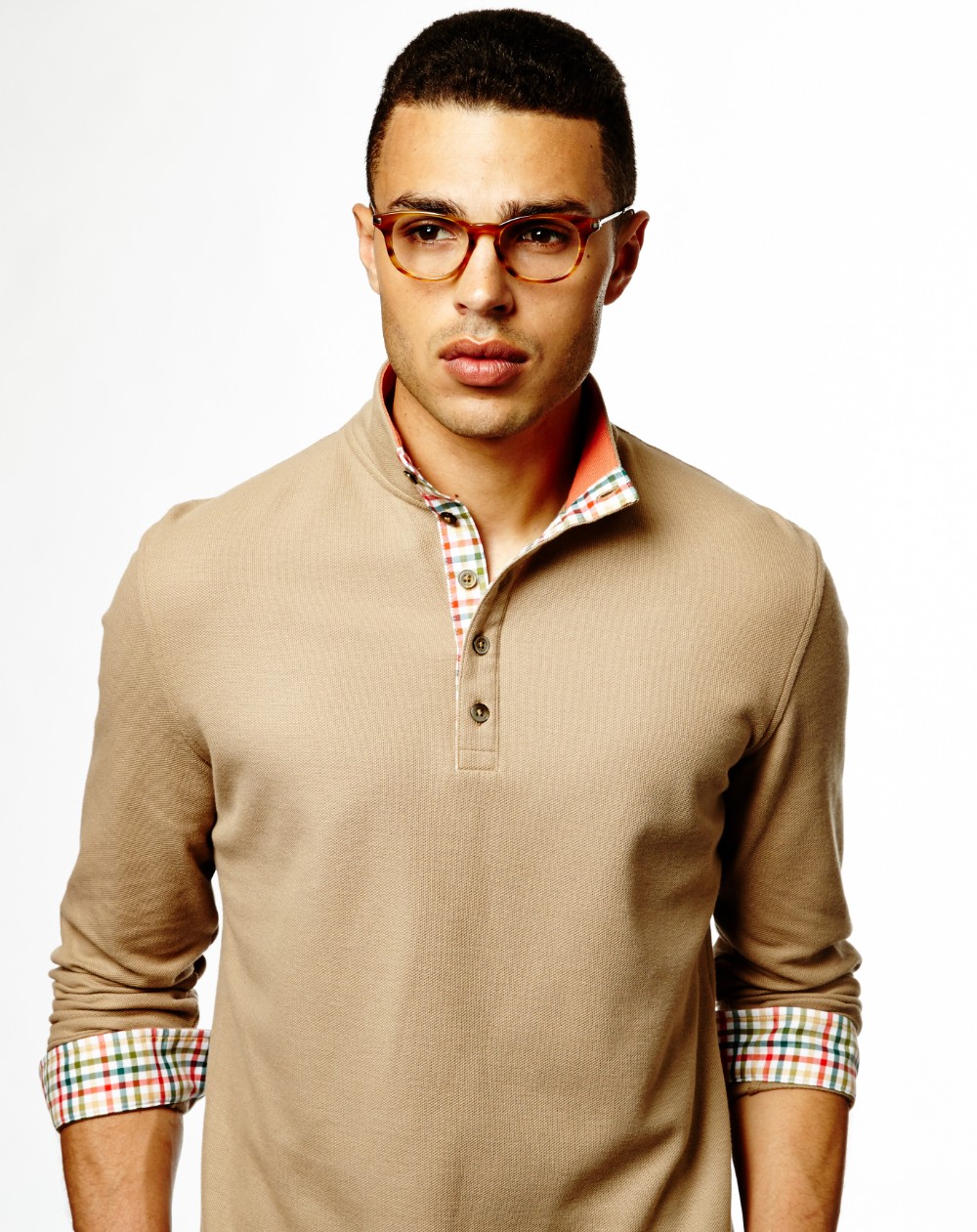 man in khaki long sleeve polo shirt