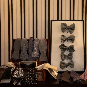 custom men's bow ties on display in store