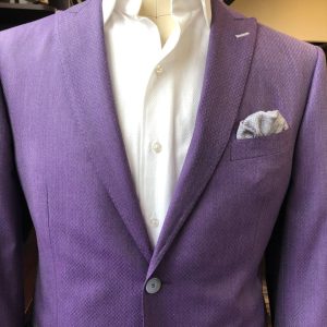 men's purple sport coat with grey trim on mannequin