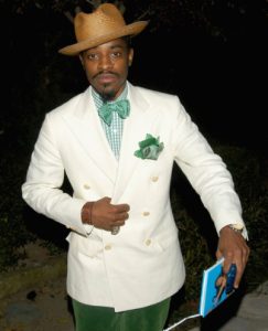 andre 3000 in white jacket and green bowtie