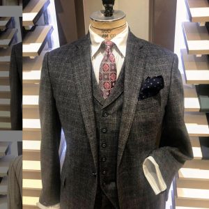 three piece suit on bust form