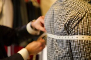 tape measure around custom suit customers overarm