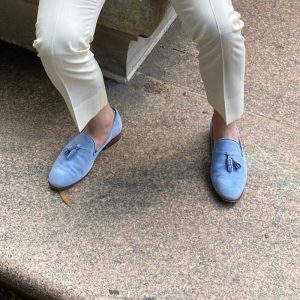 blue tassel loafers with light pants