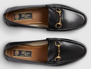 black leather gucci loafer
