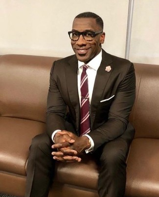 shannon sharpe in brown suit and tie