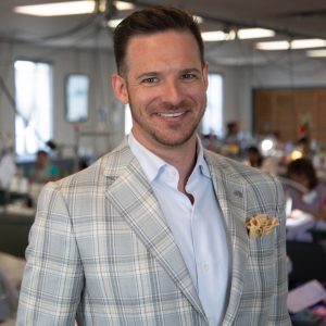 tailor in philly smiles in custom plaid sport jacket