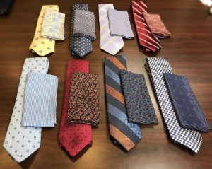 eight ties and coordinating handkerchiefs