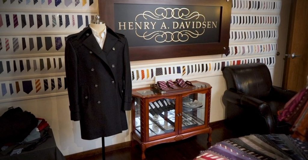 Henry A. Davidsen elegant showroom in Philadelphia with bespoke suits on display and tailoring workstations